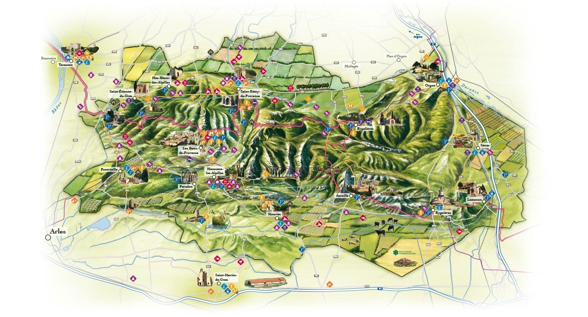 Illustrated map showing a hilly and green landscape with roads, landmarks, and various symbols representing locations such as towns and points of interest.